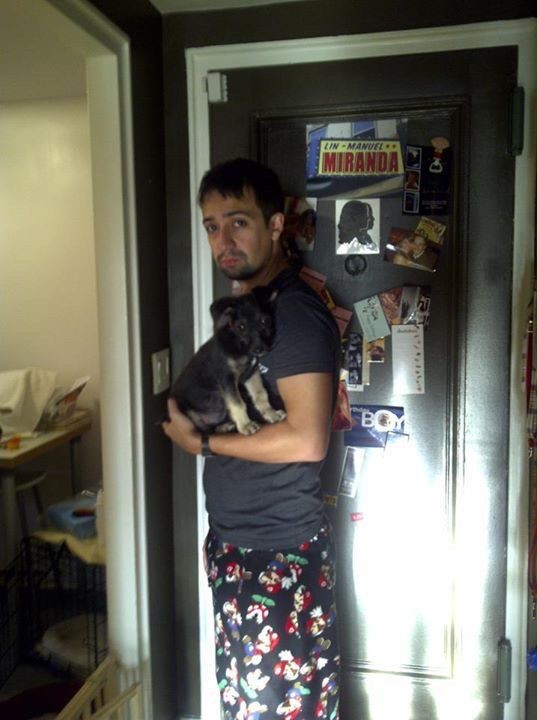 LMMthings_'s tweet image. Lin on his Mario pijamas holding Tobillo while standing