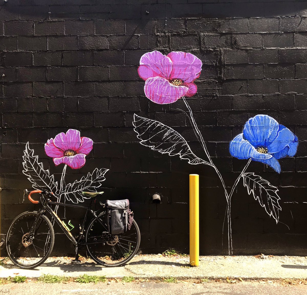 Interpersonalis's tweet photo. Can still bike to work during COVID times when work is a mural. I’ve biked here every day and and all my supplies fit into that one saddlebag, which is an accomplishment that I am v v proud of. https://t.co/MUetHnOcea