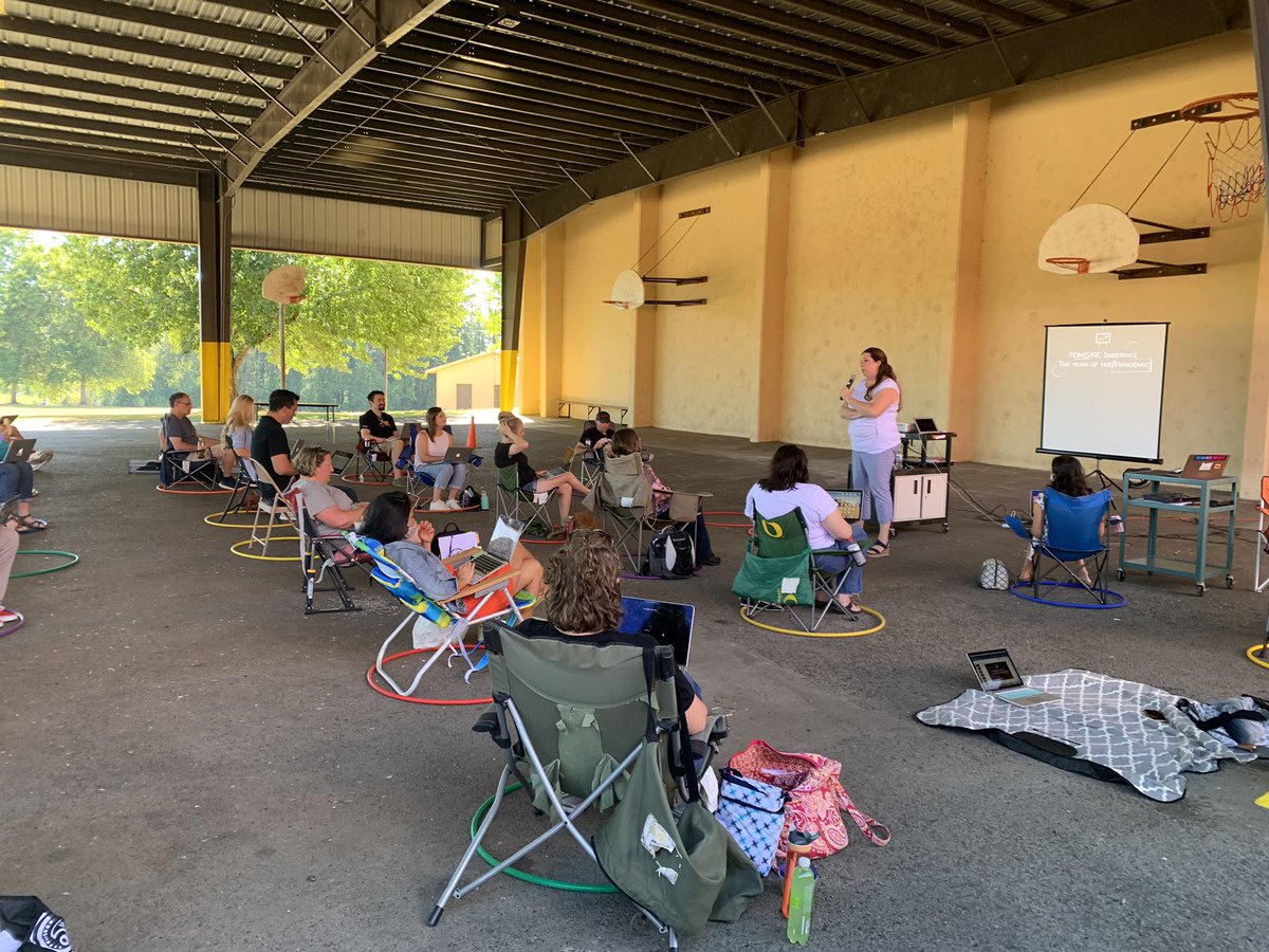 FiveOaksMS's tweet photo. Five Oaks and Rachel Carson teachers are physically distant as they start prepping for the school year. #pandemicteaching https://t.co/dccA9ygbfF
