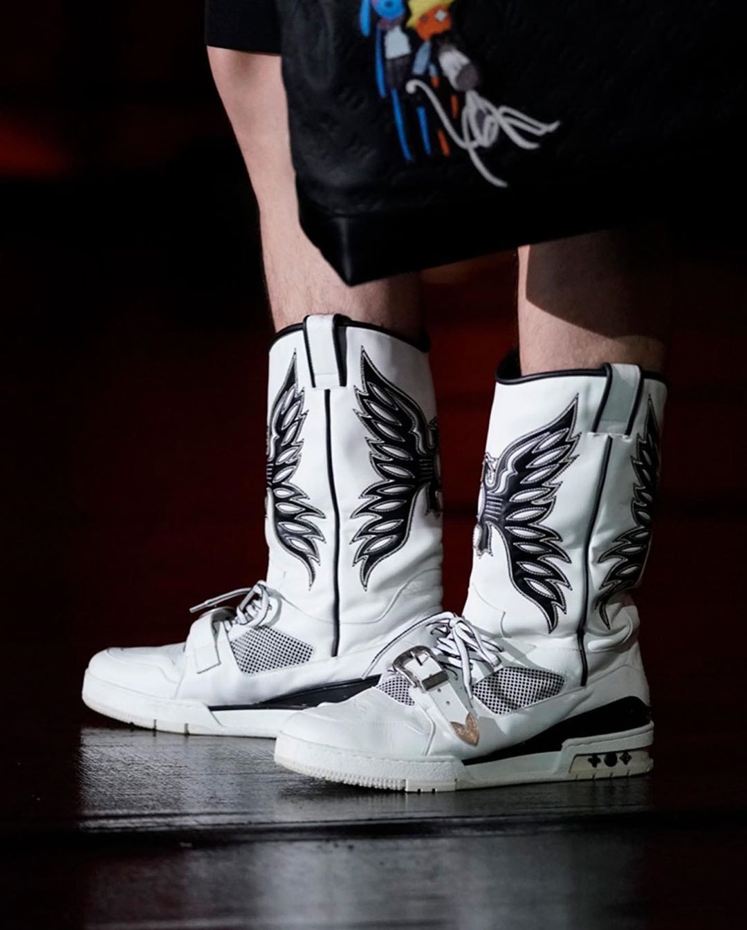 HYPEBEAST on X: #LouisVuitton unveiled its cowboy boot-inspired sneaker  during its Spring/Summer 2021 runway show. The silhouette features the LV  408 Trainer tooling under a phoenix-printed leather cowboy boot upper. Stay  tuned