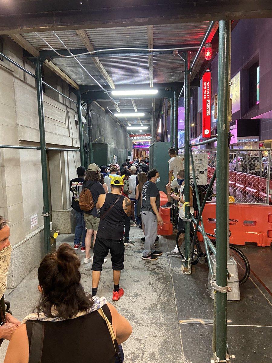 5/7:59 PMThe pro Trump protesters walked about a quarter block west on 46th Street from Broadway (the video before was from under the American Eagle entrance.) There were many police on both sides of this construction cover. This photo is looking East.