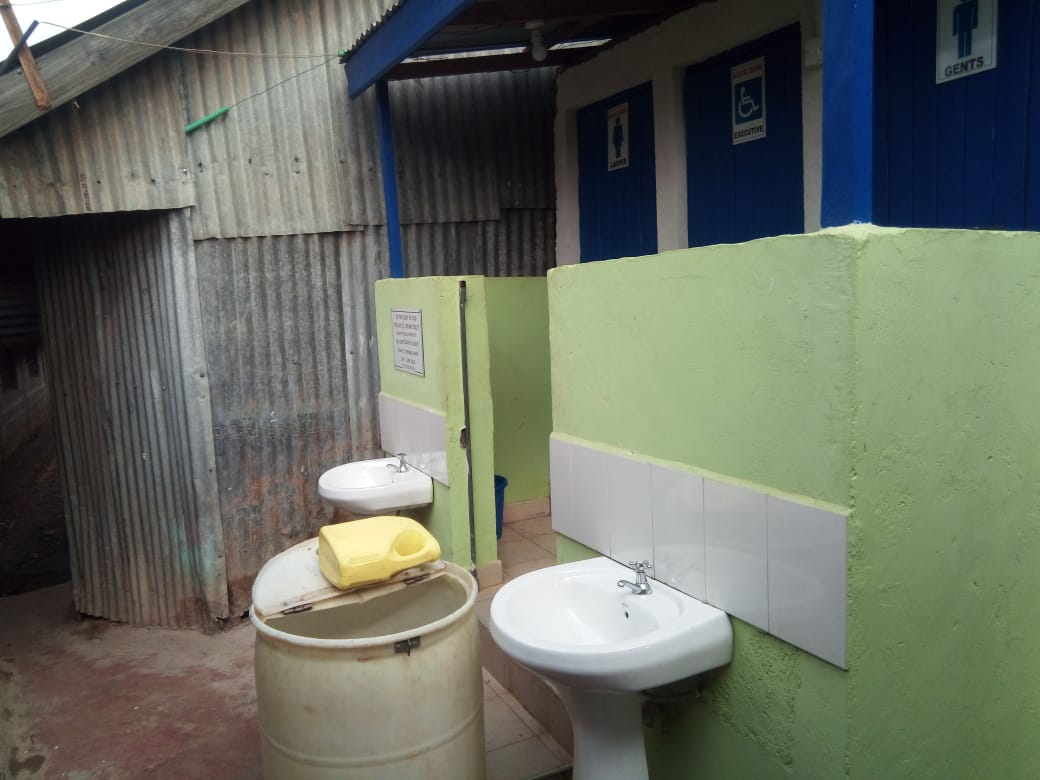 ChallengeAid's tweet photo. Before and after of the toilets at #StJeromeSchoolofHope. The church contributed to build the new one but it is not in use yet; a water storage facility funded by #ChallengeAid will make it fully operational. https://t.co/mwEkIl4716