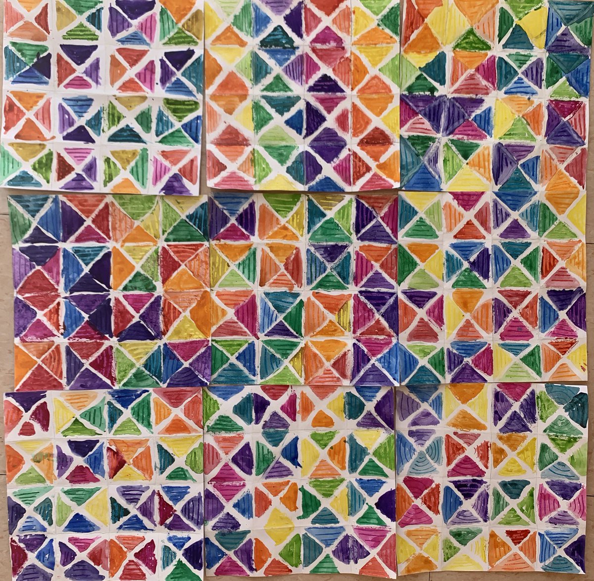 Fourth grade color quilts- exploring color theory and defining analogous colors in a watercolor resist.