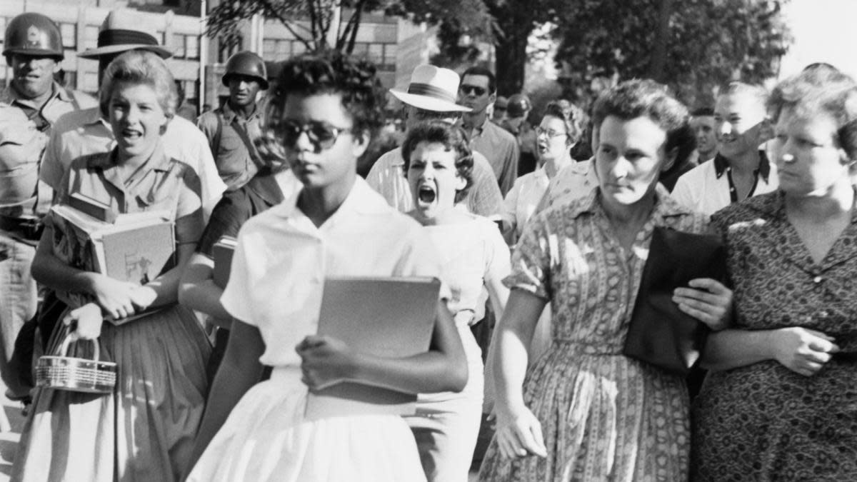 A photo from 1957 showing white students taunting and yelling at an African American student named Elizabeth Eckford at Central High School in Little Rock.