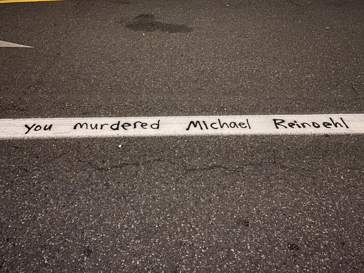 Antifa black bloc outside the Kelly Penumbra police building in SE Portland wrote this everywhere on the street: “[Portland Police Bureau] murdered Michael Reinoehl." Reinoehl, the  #antifa shooter, was wanted by police for killing Aaron Danielson. He was shot dead last night.