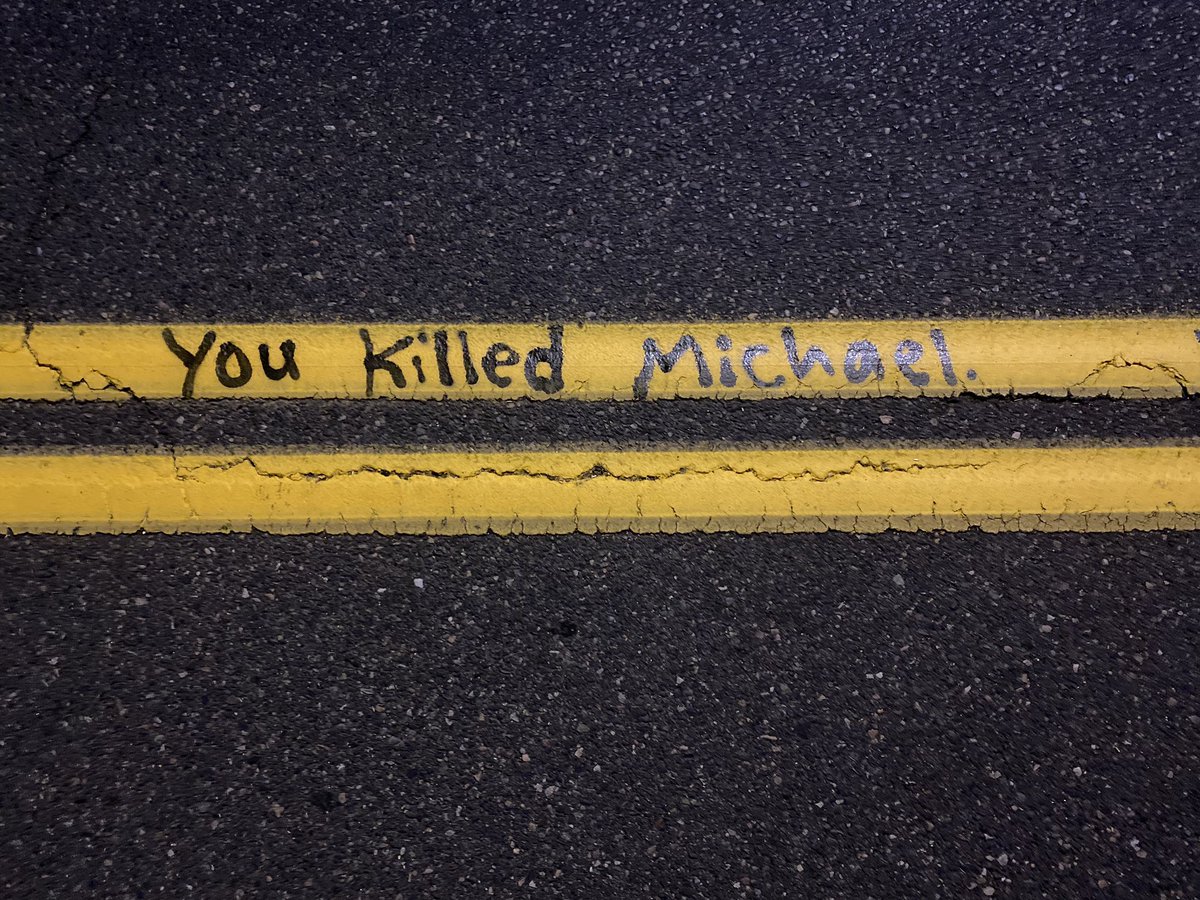 Antifa black bloc outside the Kelly Penumbra police building in SE Portland wrote this everywhere on the street: “[Portland Police Bureau] murdered Michael Reinoehl." Reinoehl, the  #antifa shooter, was wanted by police for killing Aaron Danielson. He was shot dead last night.