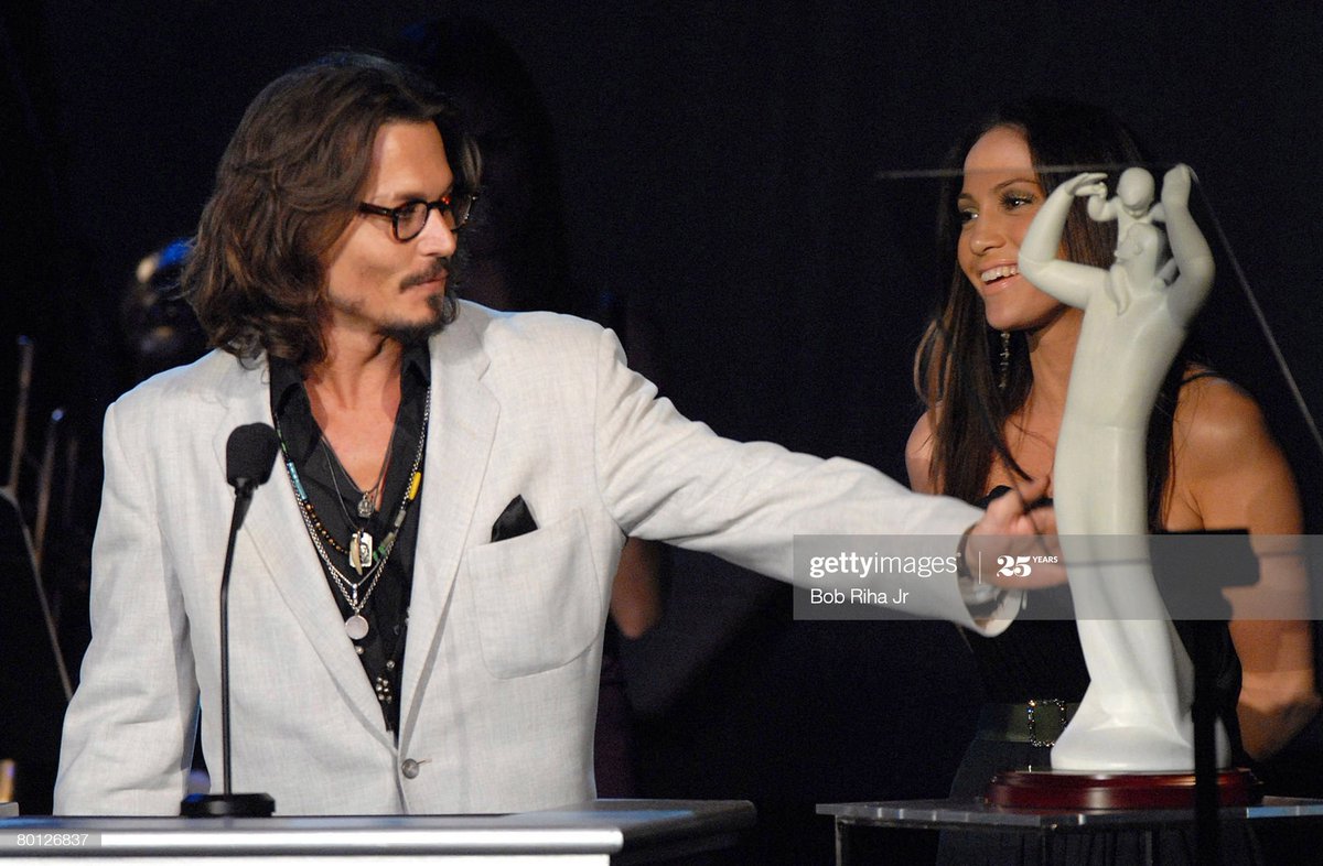 2006:  #JohnnyDepp accepts the 'Courage To Care' award from  #JenniferLopez (CHLA 2nd Noche de Ninos Gala)2010:  #Jlo "I've worked with a lot of hot leading men, but I'm desperate to get Johnny.Working with him would be out of this world."