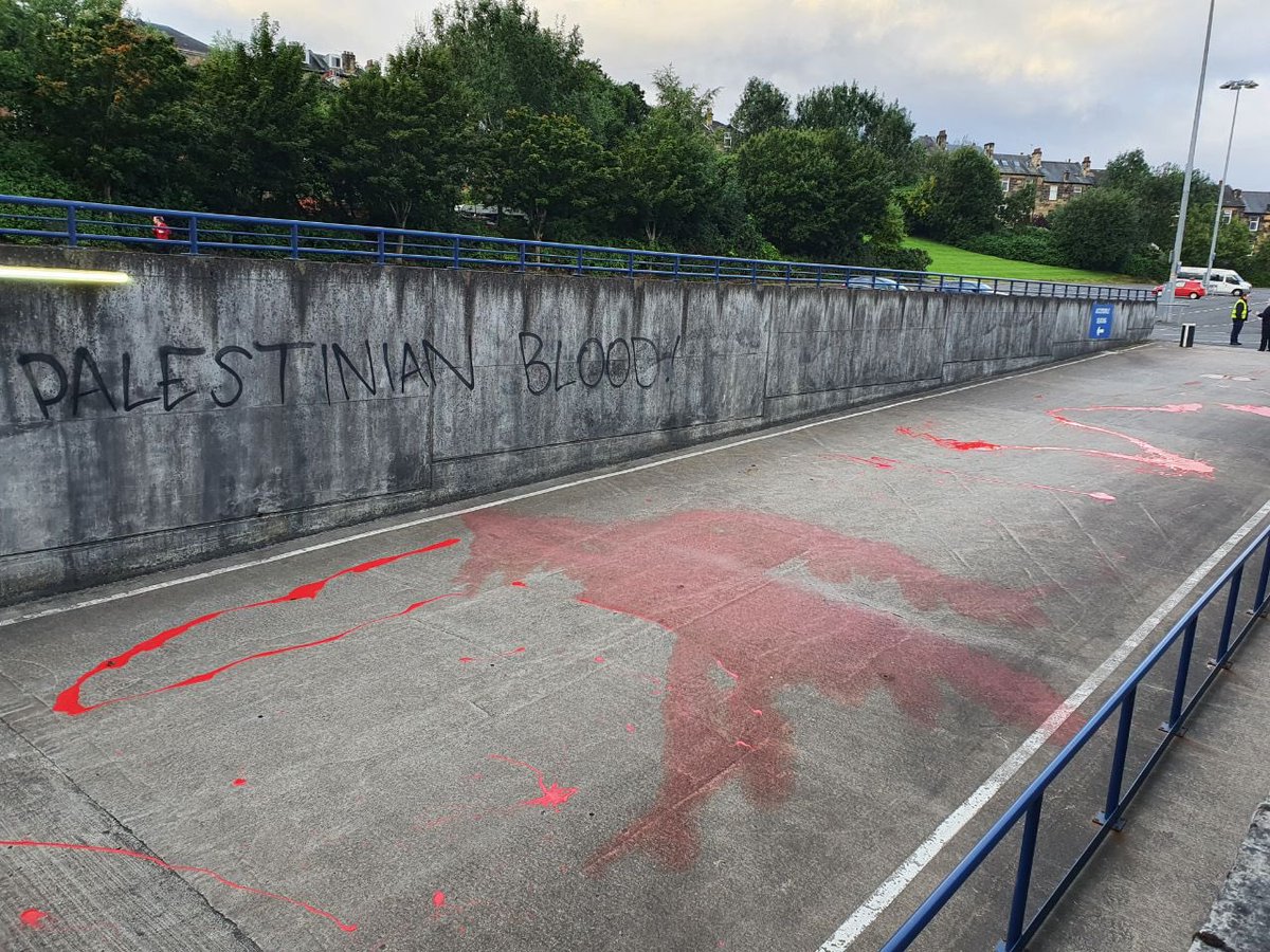 Liam_O_Hare's tweet photo. The path of the Israeli football team’s bus has been painted blood red by activists in Glasgow ahead of tonight’s Nations League game against Scotland. https://t.co/CTalnsvyTd