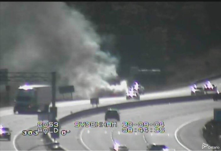 kingstonist's tweet photo. OPP are currently on scene at a vehicle fire on westbound Highway 401 just west of the Sydenham Road exit. Please avoid the area if possible and expect delays. #ygk #hwy401 #Traffic https://t.co/SjaBk7pL4f