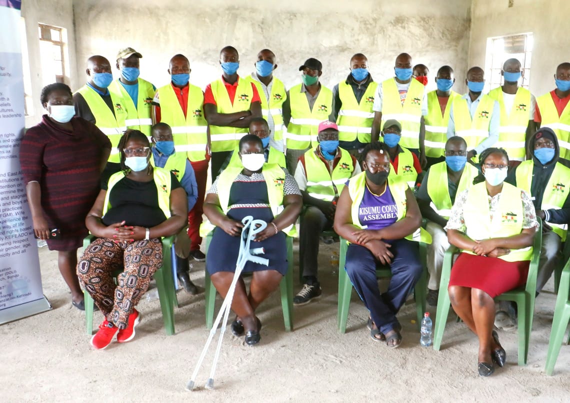 #KisumuToday
Manyatta "B" ward Boda-boda riders pose for a group photograph with (Seated from L-R) KEFEADO Executive Director Mr Easter Okech, Governor's Advisor on PWD Affairs Hon. Caroline Agwanda, Manyatta"B"MCA Hon. Pamela Odhiambo and NTA ED Ms Irene Otieno