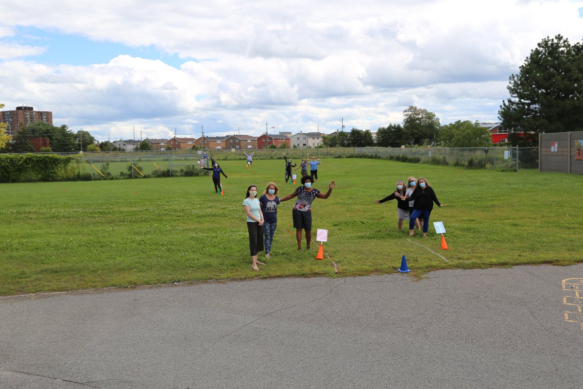 StDanielOCSB's tweet photo. We have each cohort area marked out with flags, white paint and cones! There is still a lot of room for everyone! https://t.co/ThV9wqfL9q