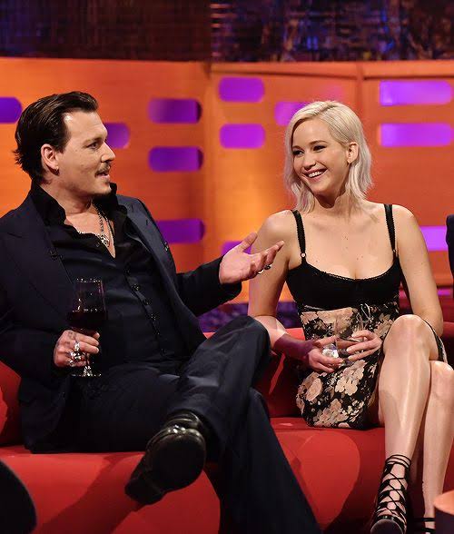  #JenniferLawrence playfully punches  #JohnnyDepp in the face when he starts doing his DonaldTrump Impression. #GrahamNortonShow (2016)
