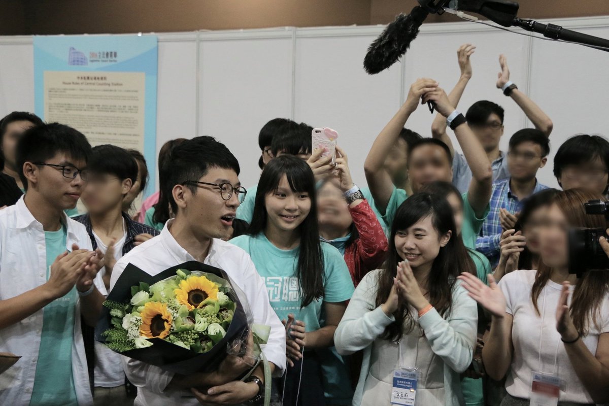 FreeHKMeow's tweet photo. HK Legco Election 4 years ago. Who would have imaged what they have to face today: one in exile, one arrested under the NSL, one being tracked by secret police, one facing constant defamation and attacks by state propaganda. 
Their smiles in the photo make my heart aches. https://t.co/CqZcLhorFo