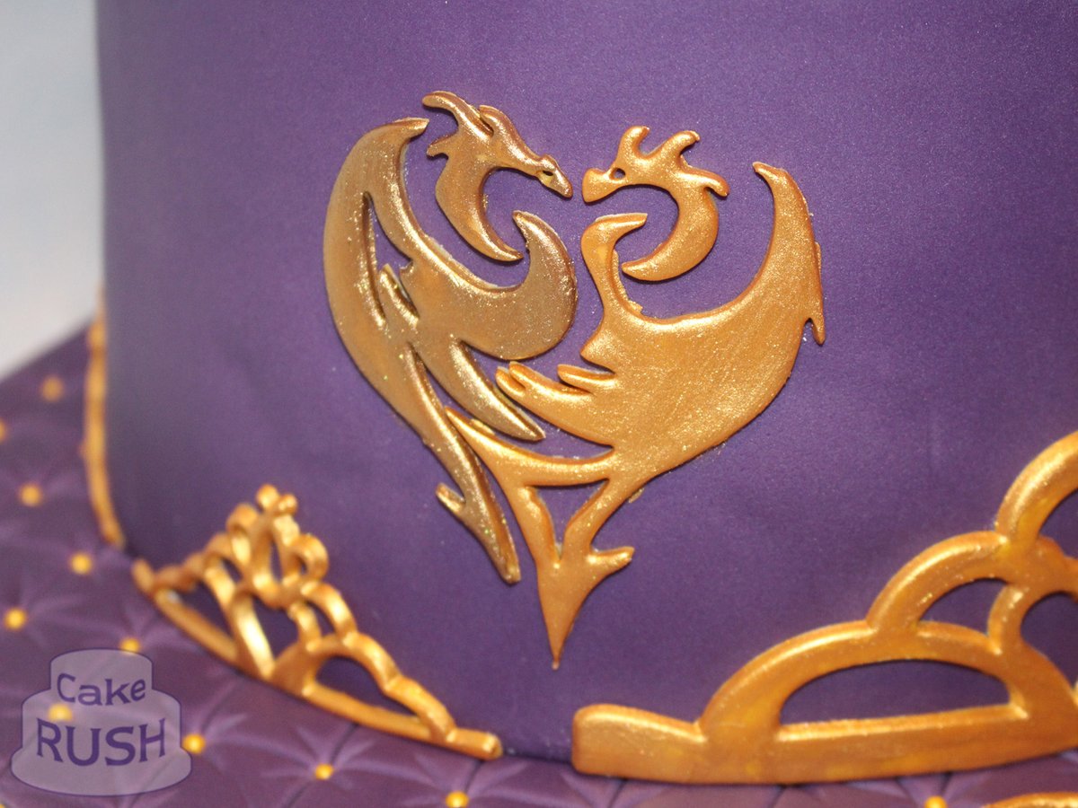 CakeRush's tweet photo. Bryony's choice this year is Disney Descendants, so we made this two-tier cake in elegant royal purple, with details in red and gold, plus a suspicious-looking apple on top!

Who's your favourite - Mal, Carlos, Jay or Evie? 🙂

#Descendants #birthdaycake #cake #Disney https://t.co/5waoicsy2d