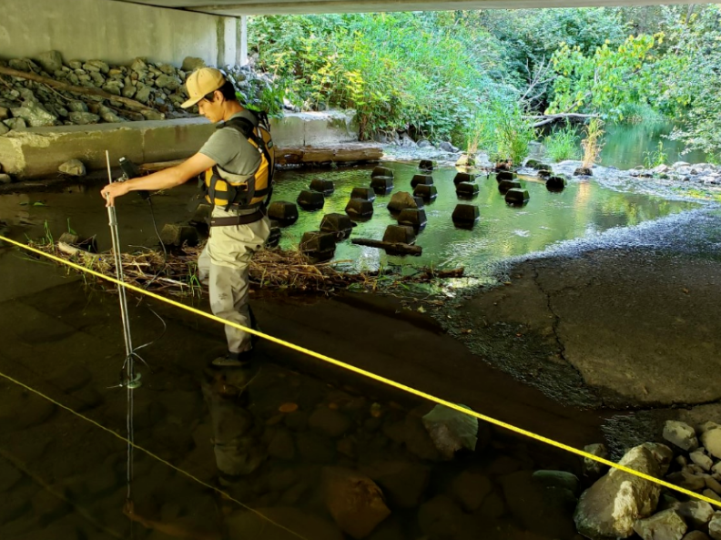 USGS_WA's tweet photo. One USGS streamflow station is actually in Canada. Specifically 00° 00' 09" into Canada, which has closed it's U.S. border. Water Survey of Canada to the rescue ! They have offered to tend our gage  in the interim (that's Peter Bi measuring flow). Thanks ! https://t.co/O5PxNUBje2 https://t.co/Xrkem7xiCi
