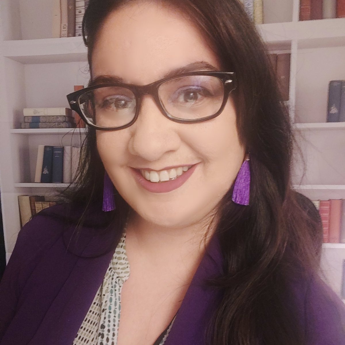 Jocelynthoughts's tweet photo. Purple Blazer ✔️ 
Purple Eyeshadow &amp; Lipstick ✔️ 
Purple Earrings ✔️
Oops almost forgot my Purple Rain album in the background 💜 @Jocelynthoughts
  #CollegeColorsDay #accriverbats  #ACC4everyone https://t.co/oCwc7yMTwj