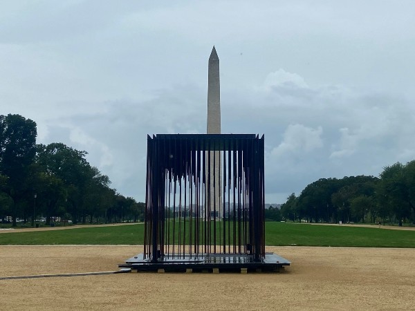 DCist's tweet photo. Visitors are invited to stand inside "Society's Cage," a new art installation on the Mall depicting systemic racism, and hold their breath for as long as possible, then post a video on social media discussing how it made them feel. https://t.co/NaW2WlGTKj https://t.co/gTXS14oT7d
