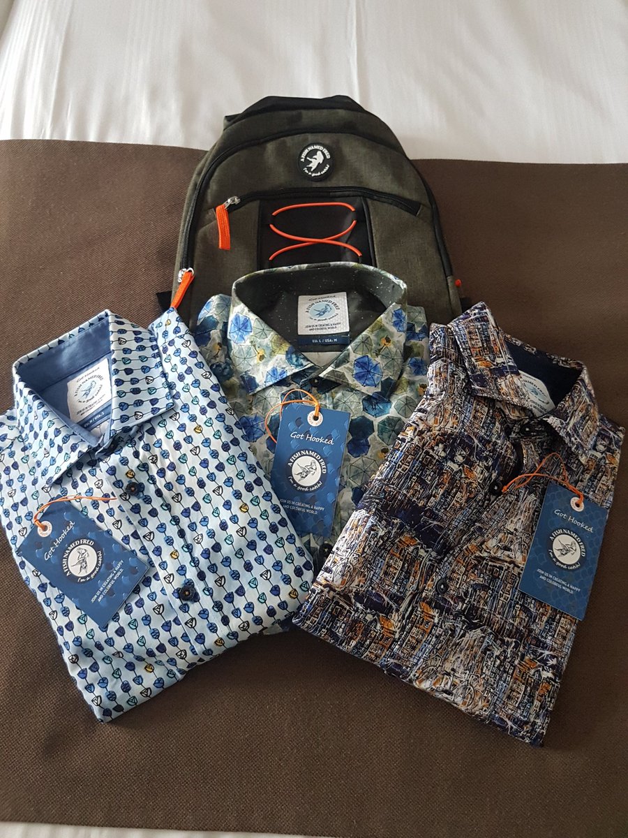 Running_Eric's tweet image. #afishnamedfred Net weer 3 mooie overhemden gekocht en op de koop toe een mooie rugtas gekregen.