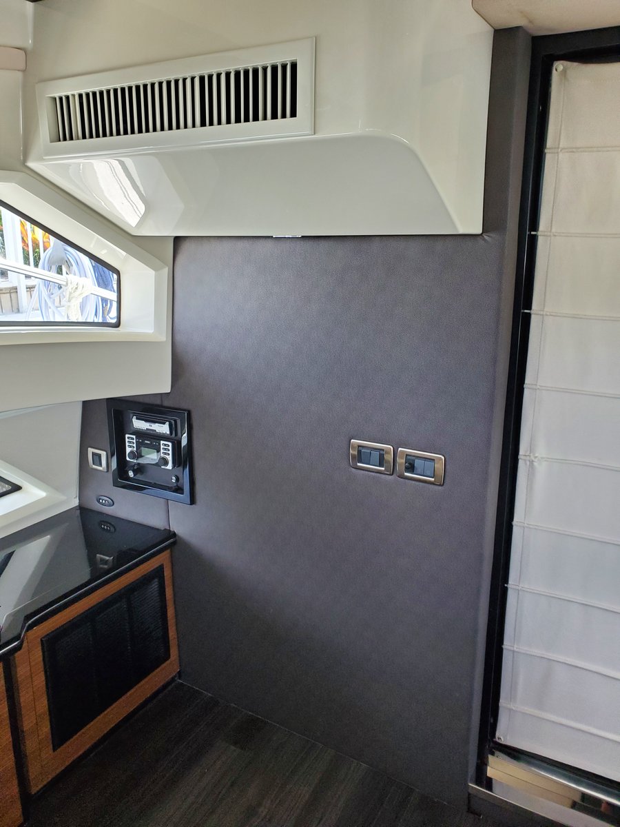 Beautiful project (Before and after pics) 👌 We recovered 3 back panels in salon to match existing other black panels for a 50' Marquis. We are extremely happy with the results, we gave the interior of this boat a new look and we take pride in that.