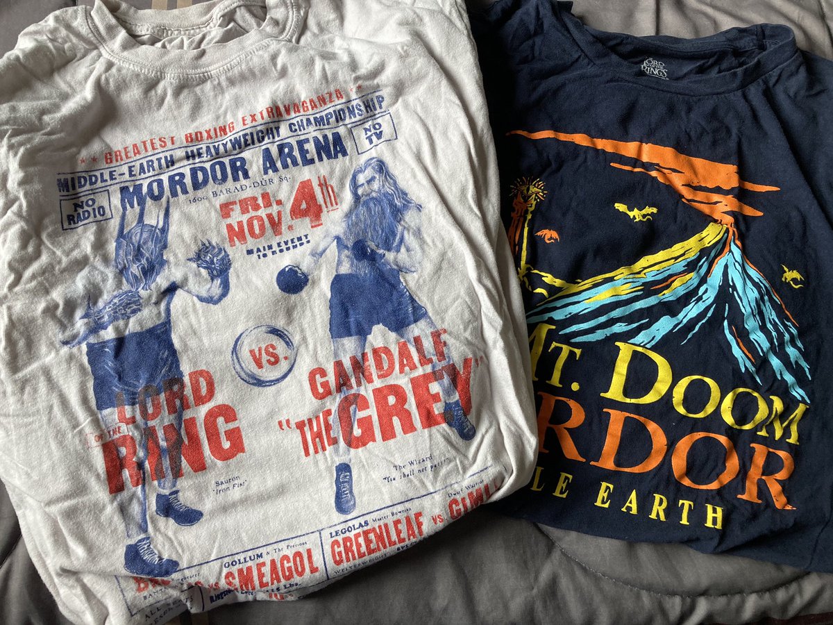  #TolkienEveryday Day 42Two of my favourite LoTR t-shirts (ignore the wrinkles)