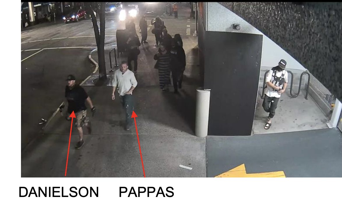 Authorities said Reinoehl looks back toward Danielson. While nobody seems to be bothering him, Danielson appears to already be carrying mace in one hand and an expandable baton in the other. Reinoehl moves into a parking garage and puts his hand around his waistband.