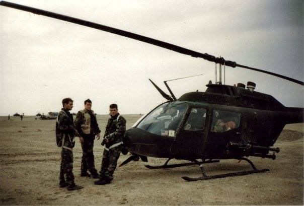 FPWellman's tweet photo. This is me with my OH-58 during my first combat tour in Desert Storm with crew chief, and now Cincinnati police officer, Dave Corlett and Apache pilot, and now astronaut, Shane Kimbrough. No losers. Heroes still. #WeRespectVets #LincolnVeteran https://t.co/xdCL1JXGeD