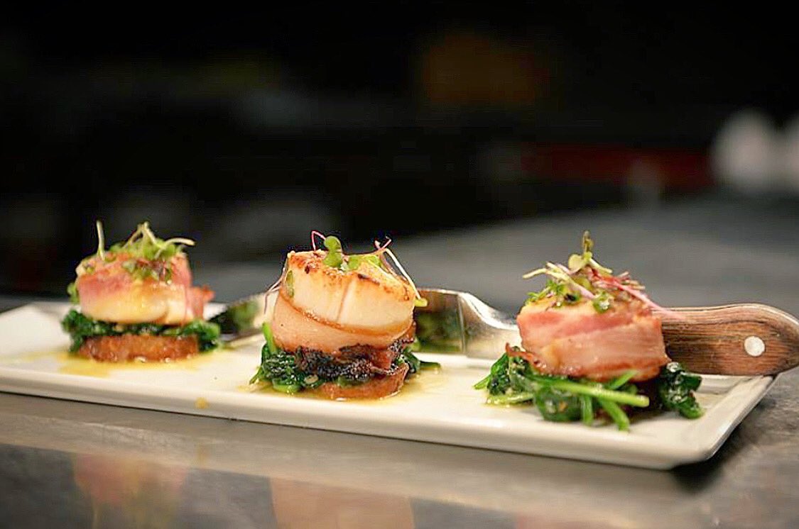 Bacon-wrapped scallops, a fabulous start to dinner and the long weekend! Available for dine in or to-go in Pearland and in the Woodlands - reservations and online ordering at killenssteakhouse.com. #scallops #bacon #killenssteakhouse #fridaynight