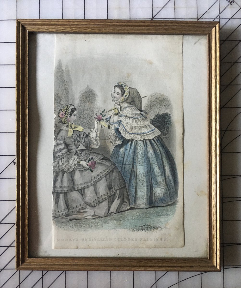 The other framed print is c. 1850 Godey’s Unrivaled Colored Fashions. Godey's Ladies Book is 1830–1878, with Sarah Josepha Hale as editor 1837-1877. Under her leadership, circulation went from 10K to 40K in her first 2 years, and 150k by 1860.