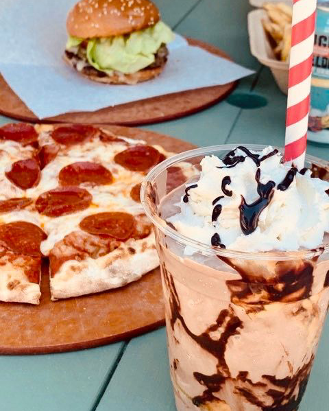 Pub1954's tweet photo. It’s going to be a scorcher this weekend. Cool down with one of our delicious boozy shakes! 🍦We’ve teamed up with @saturncafe to create grown-up versions of your childhood favorites, like the Bourbon Brownie. 🍕🍔

#Pub1954 #PieAndCone https://t.co/uGhh74fZ1Q