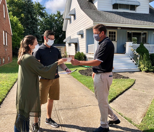 ParmaMayor's tweet photo. Ward 3 Councilman Mark Casselberry and I gave newlyweds Melanie &amp; Tyler Tapajna a Citizen of the Month Award &amp; Parma Pride sign. Following their wedding ceremony and while stilled donned in formal attire, the couple served their donated reception meals to Laura's Home residents. https://t.co/bh7DUNfIVz