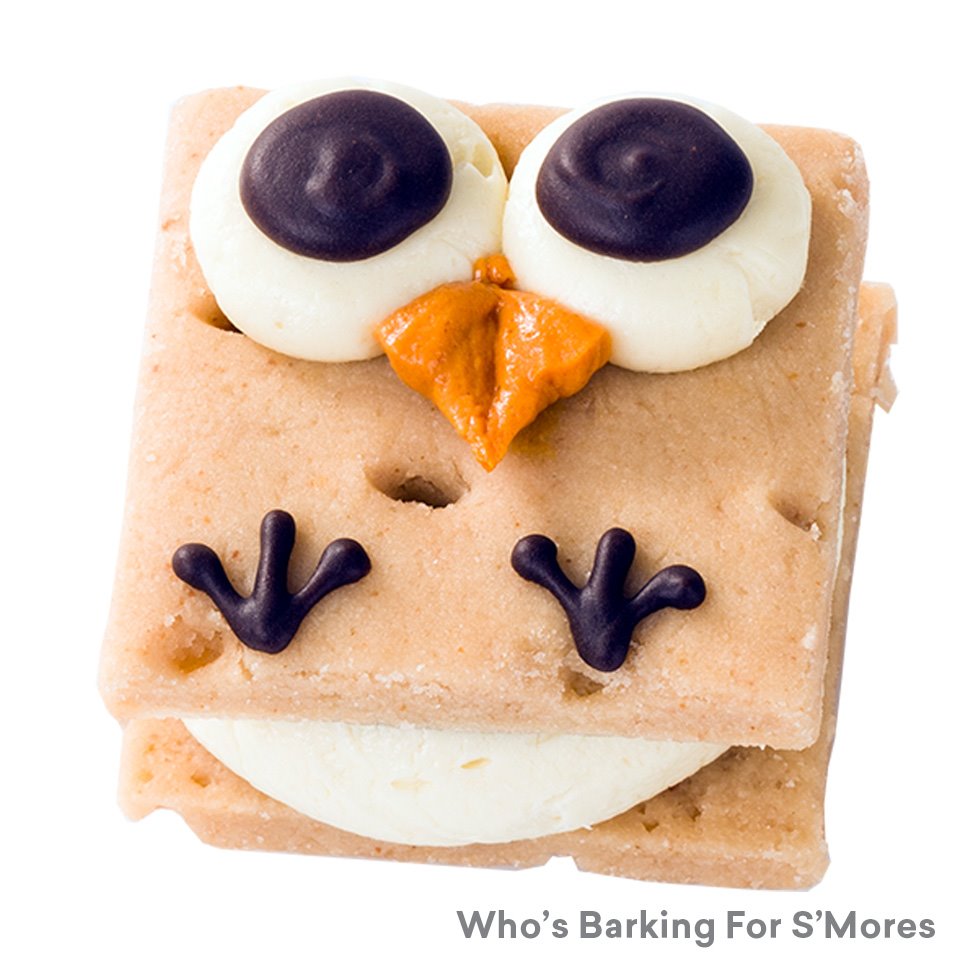 Our wheat-free S’Mores for dogs gets updated for fall with an owl design. Inside is a layer of frosting and carob sandwiched between two rice flour, peanut-flavored cookies.