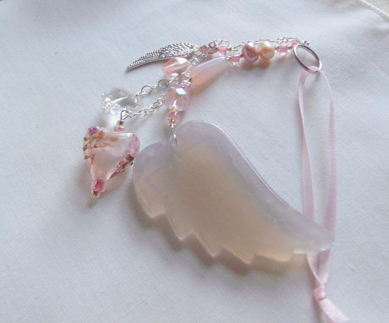 annimae9's tweet photo. Loss of baby girl gift - grieving memento - car charm - window pendant - agate wing - silver wing - always in my heart - funeral memory #Lizporiginals #jewelryandhomedecor #lossofbabygirlgift #pinkagatewing #grievingmemento #carcharm #windowpendant  https://t.co/nqsSou08Eq https://t.co/6fnmrkZzOj