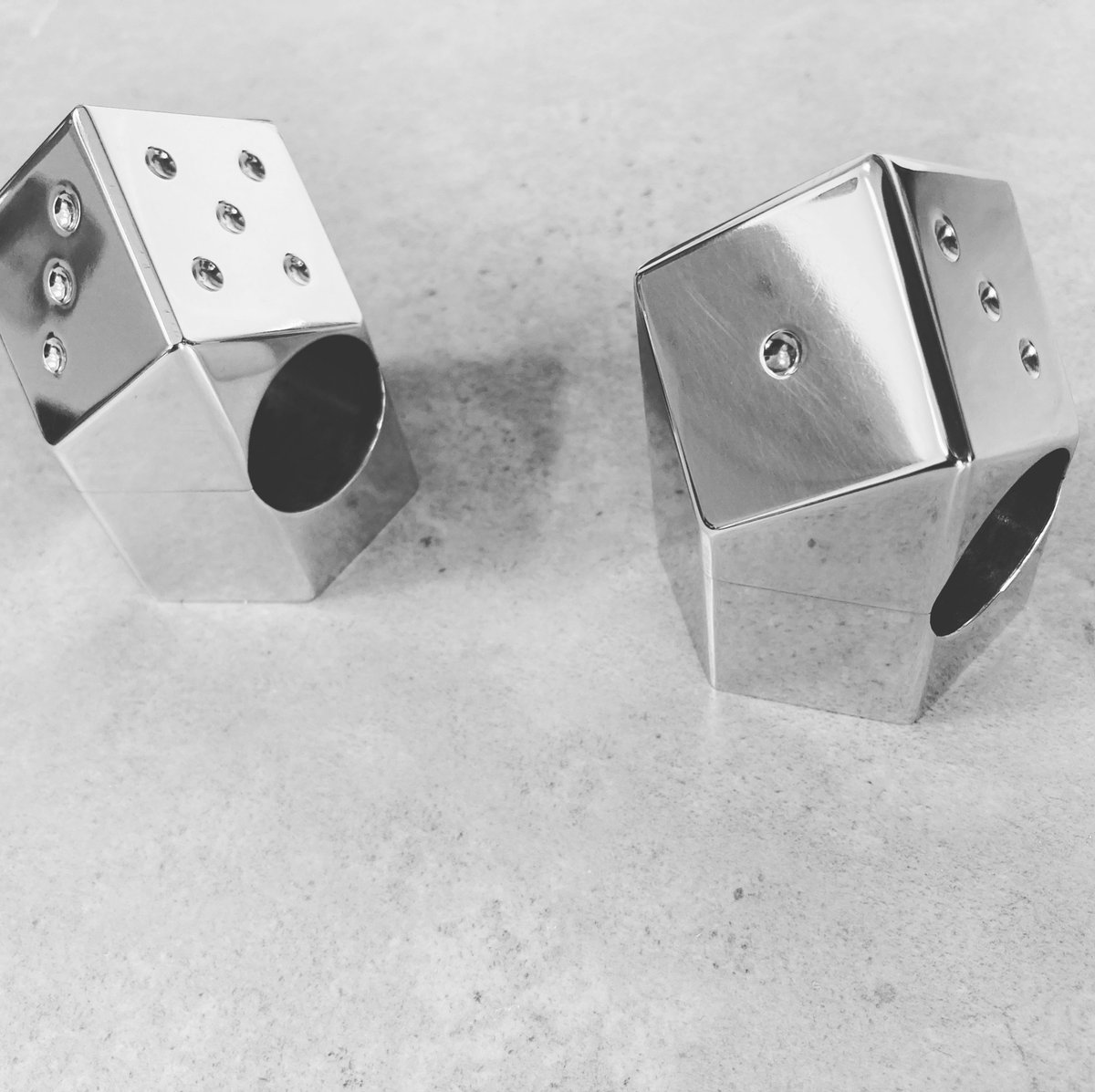 AnsteyE's tweet photo. Dice handlebar risers machined from solid aluminium. #ukmfg #cnc #chopper #HarleyDavidson https://t.co/041QucmBO5