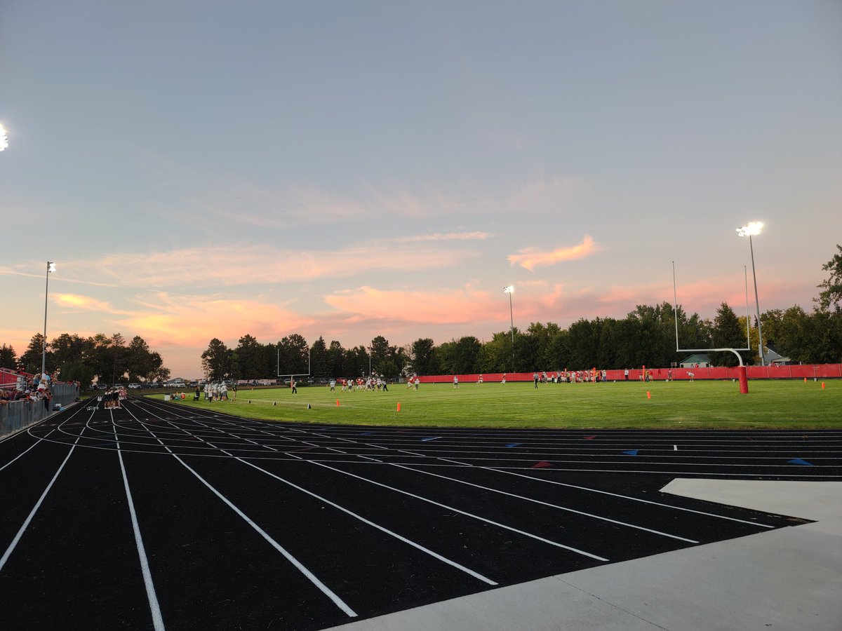 Carjam95's tweet photo. Friday night lights...Go BH Braves! Tough fought win in double OT. Great game! That sky and sunset😍! #sdsunset https://t.co/5sYnhxdJiG
