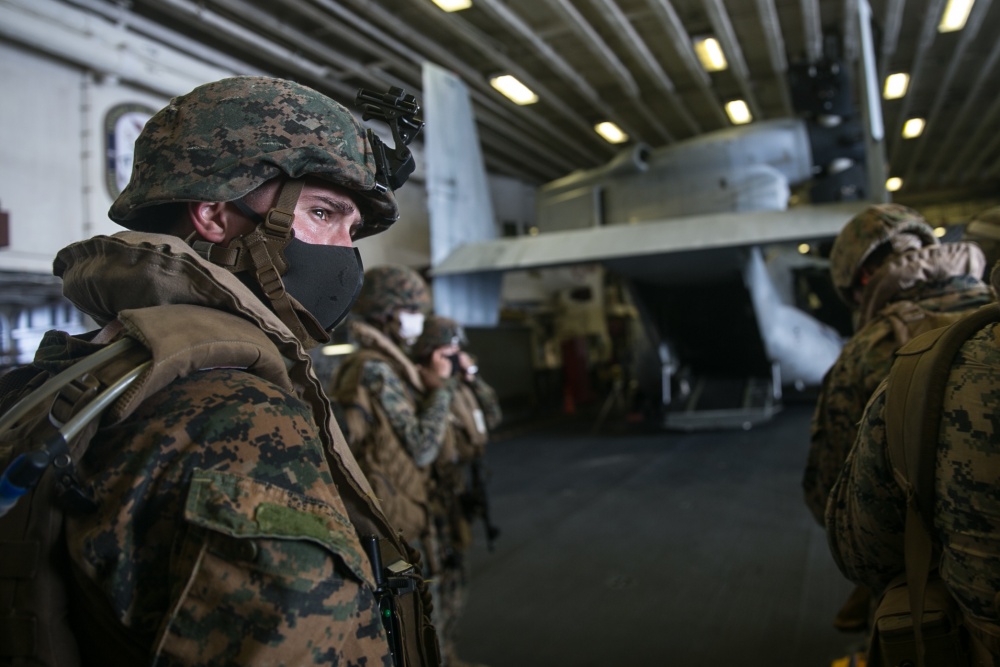 USPACOM's tweet photo. U.S. @PacificMarines with Combat Logistics Battalion #CLB31, @31stMEU conduct noncombatant evacuation operation #NEO training exercises aboard @USPacificFleet amphibious assault ship USS America #LHA6. #ForgedByTheSea #SemperFi #FreeandOpenIndoPacific. https://t.co/ShDgqXBJlS
