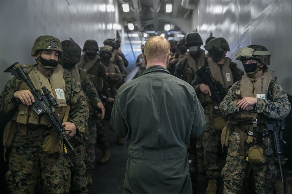 USPACOM's tweet photo. U.S. @PacificMarines with Combat Logistics Battalion #CLB31, @31stMEU conduct noncombatant evacuation operation #NEO training exercises aboard @USPacificFleet amphibious assault ship USS America #LHA6. #ForgedByTheSea #SemperFi #FreeandOpenIndoPacific. https://t.co/ShDgqXBJlS