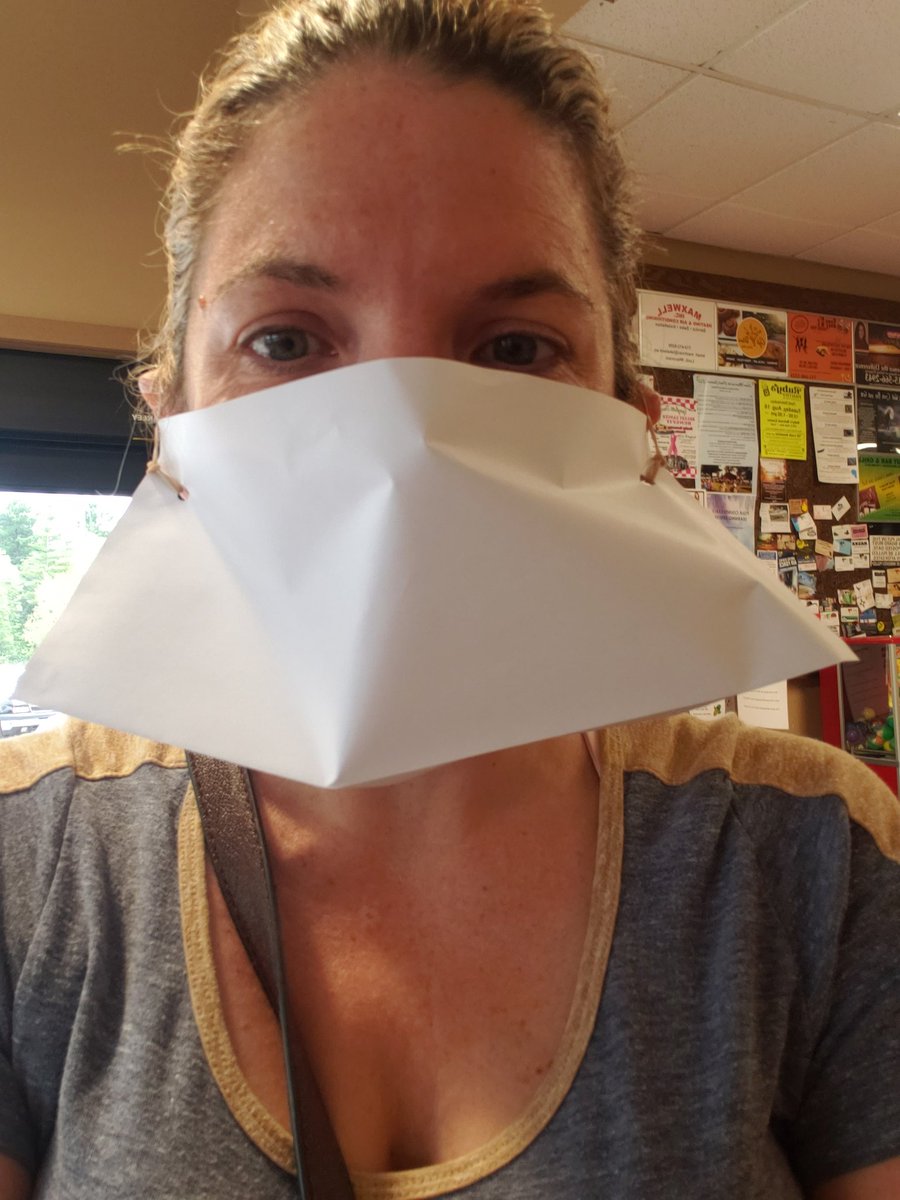 MarshaMelloh's tweet photo. @beth_whitlock A grocery store in Wisconsin had options for customers in case they didn't have their own. It's printer paper folded in half; rubber bands for your ears. You smile and receive an eye paper cut. I did have my own but just had to show what they looked like. https://t.co/1pSudSVgZU