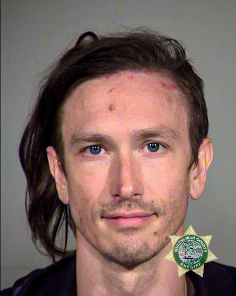 Tyler Brett Cox, a nurse at  @OHSUNews hospital, was filmed pulling off the helmet of an officer at an  #antifa riot & getting punched while on the ground. He was dressed in black bloc. He was charged w/felony assault of an officer, resisting arrest & more.  https://archive.vn/aEAMK 