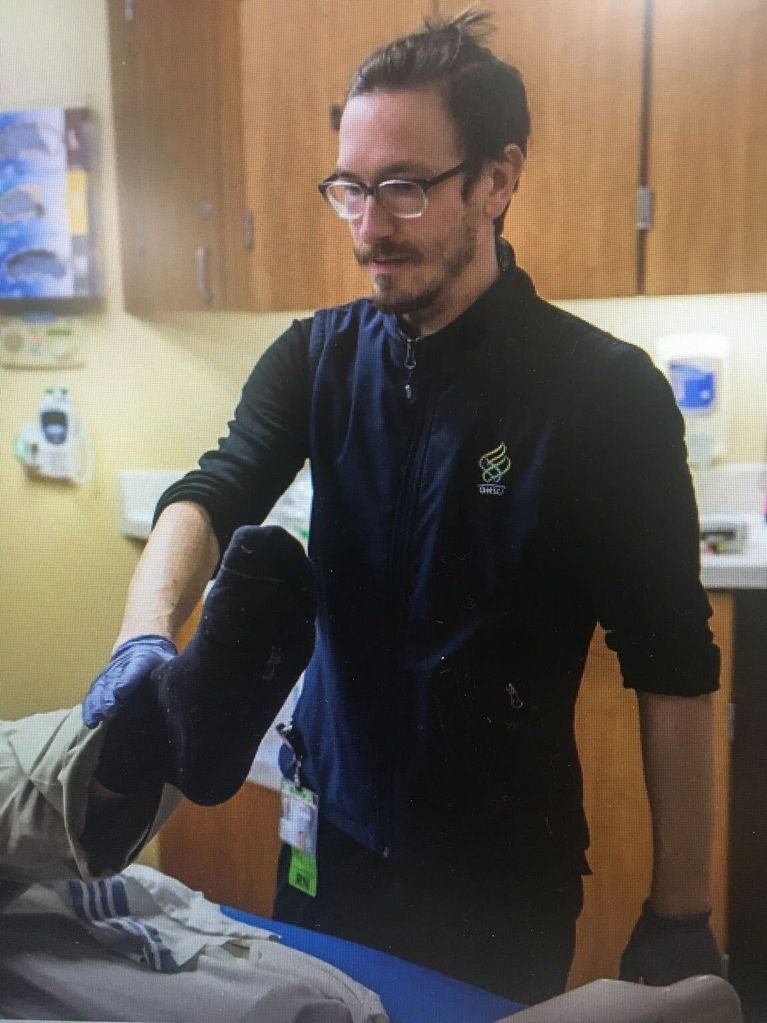 Tyler Brett Cox, a nurse at  @OHSUNews hospital, was filmed pulling off the helmet of an officer at an  #antifa riot & getting punched while on the ground. He was dressed in black bloc. He was charged w/felony assault of an officer, resisting arrest & more.  https://archive.vn/aEAMK 