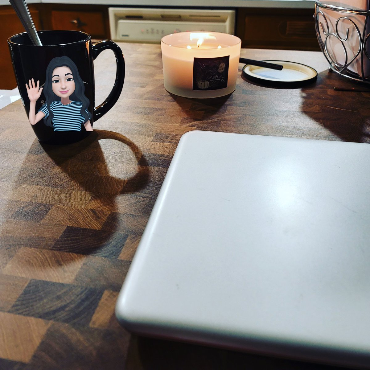 VBDragonGuard's tweet image. This is my writing space. The candle is from an arts and crafts store near me that sadly doesn&apos;t have a twitter so I can&apos;t link them. But this is my kitchen island. I have a tea in my coffee mug that is from my work. #write #writebrain #newguardian #newbook