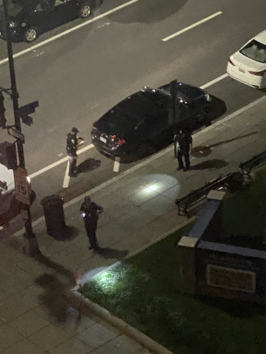 jeneps's tweet photo. @PoPville 15th and V after two sets of gunshots. Seems like they’re interested in this black car. https://t.co/xF0jW3ZgcW