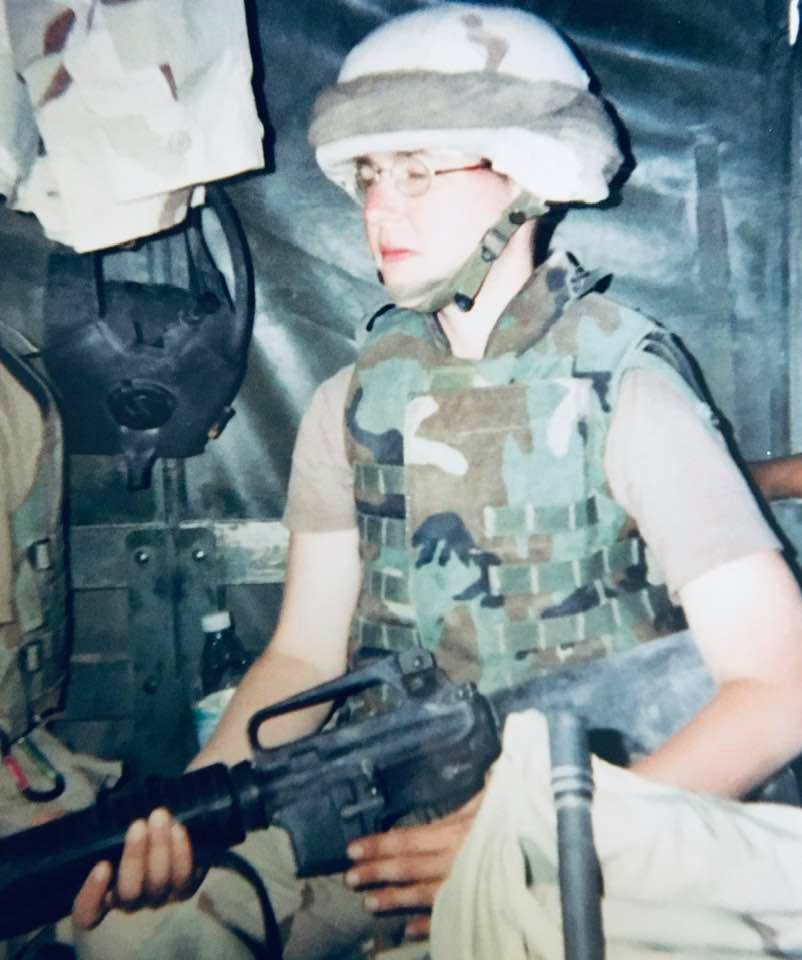 Autismmomtweets's tweet photo. @YVindman @AVindman I am a loser too. Me at 26 deployed to Iraq in 2003. A flak vest too large with no plates. Lol And 7 months post partum. #Iraq #3rdACR #FST https://t.co/sxpSlVt69u