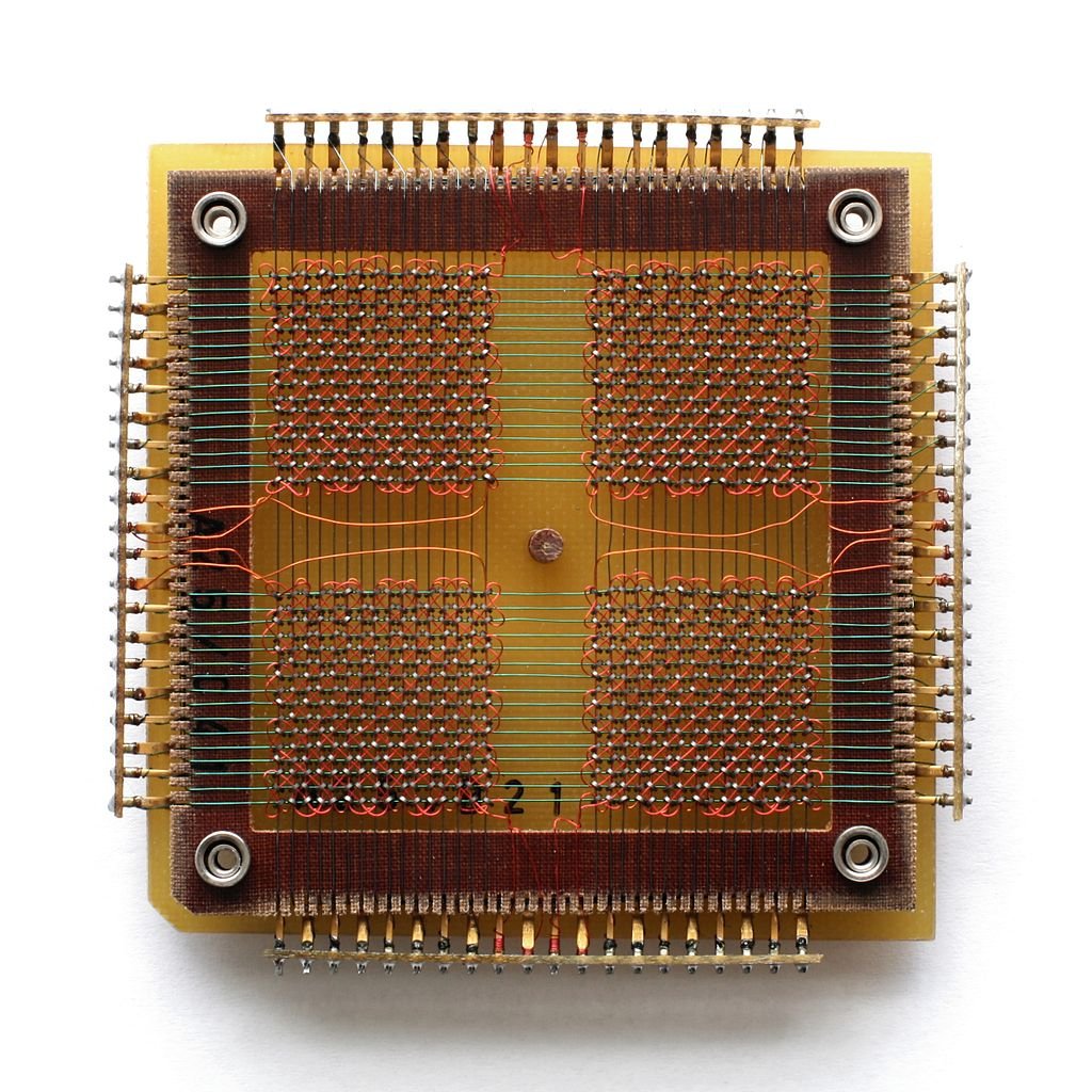 the fun thing about how core memory works is that you access each bit by a vertical and horizontal location, then you can stack a bunch of these core memory planes to get more depth.In other words, you need an X, a Y, and a Z... it's a 3D cube of memory!