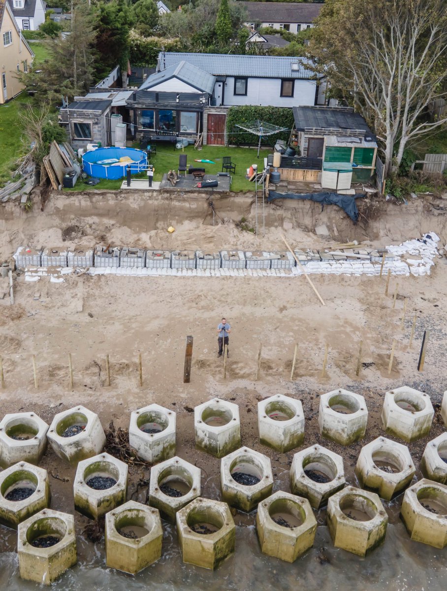 Gasheman's tweet photo. David Shevlin stands where his back garden used to be, unless Fingal Co take action, his house will be taken by the sea in less than five years. Pic by Gary Ashe #irishdailystar #coastalerosion #portranebeach @IsFearrAnStar https://t.co/AGEJE9F6TN