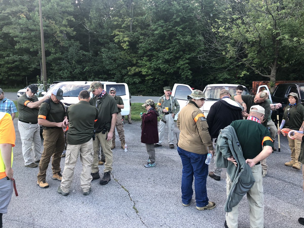 The NPDT Militia is putting on orange tape armbands to differentiate themselves from other militia groups on the ground.For the same reason, they were apparently instructed not to wear camo.Long guns will be out downtown. For now, sidearms only.