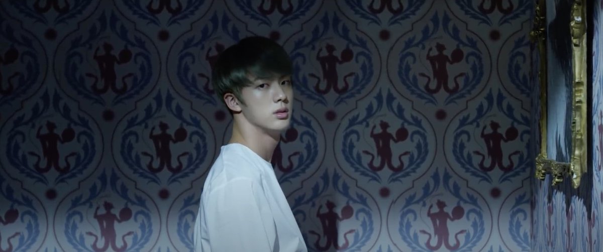 in the bedroom. Lastly, Jungkook’s sparrow hawk is hung at the end of the hallway. The god Abraxas is also the wallpaper pattern in the hallway.