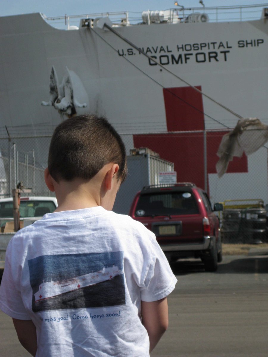 This is our son at age 6. He asked me for a moment to himself after sending his dad off on his third deployment in four years. He wore his matching shirt with the #USNSComfort on it. #RespectVets @VoteVets