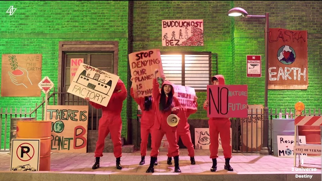 7) Climate change: the Hip MV is the first one in kpop to reference climate change. One of Wheein's personas is an environmentalist who leads a protest to raise awareness. -
