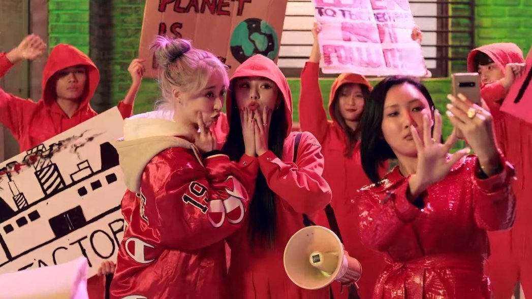 - The video also shows Moonbyul and Hwasa at the protest, only stopping by to take pictures.This highlights how people tend to be loud about social issues without actually taking any action. This emphasizes how some individuals “act” woke just to be trendy.