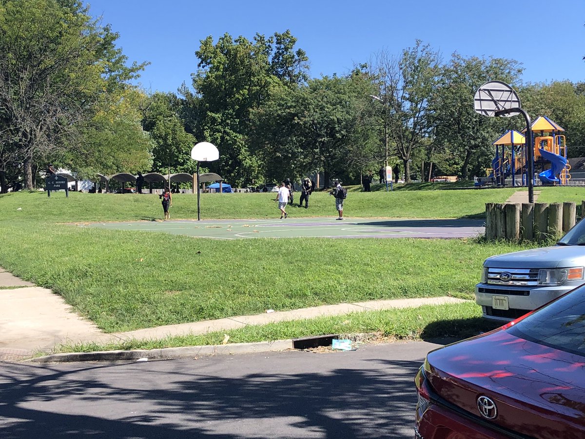 A hill separates the press from where the NFAC are forming up so it’s probably impossible to give an accurate headcount.From a distance though, I’d say there’s about 100 of them here.